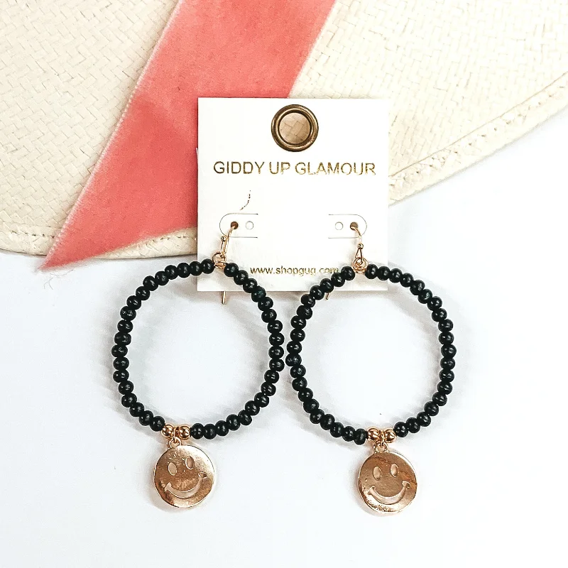 Women’s crystal stud earrings-Wood Beaded Circle Drop Earrings with Gold Happy Face Charm in Black