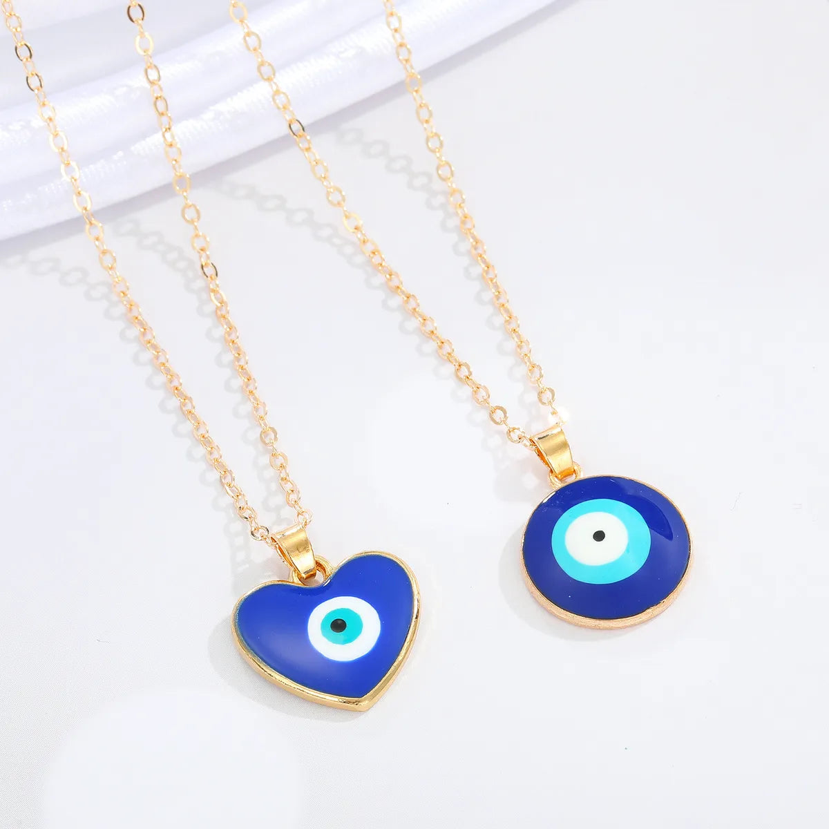 Women’s sparkling gold necklace-Fashion Peach Heart Round Devil's Eye Pendant Resin Necklace